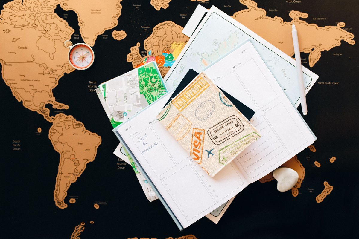 Passport, visa and travel planner on a world map